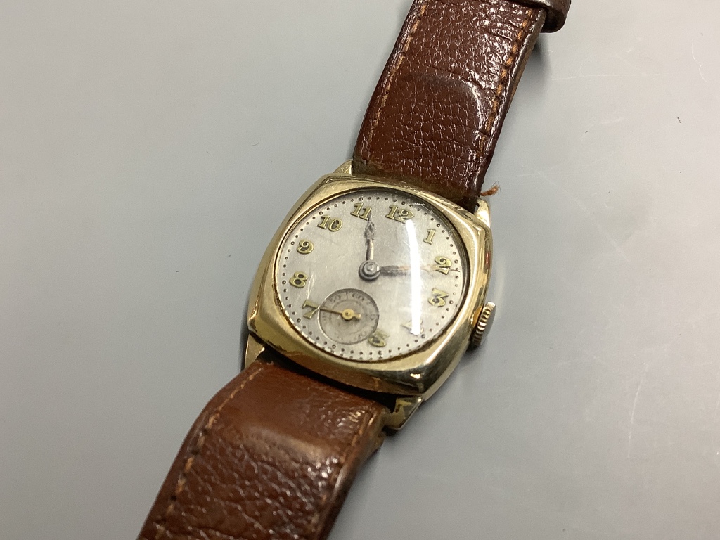 A gentleman’s 1930’s 9 carat gold manual wind wristwatch, on leather strap, case diameter 28 mm excluding crown.